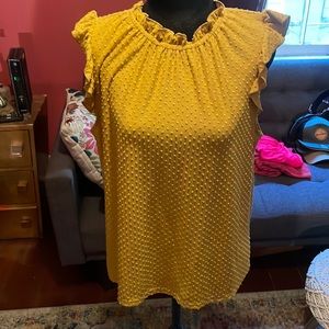 Yellow ruffled sleeveless business casual top